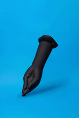 b-Vibe Vibrating Silicone Fisting Dildo on blue background, designed for intense depth play and full-body sensations.