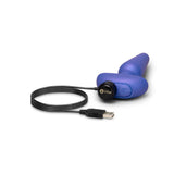b-Vibe Butties Shake Vibrating Butt Plug with USB charging cable on a white background.