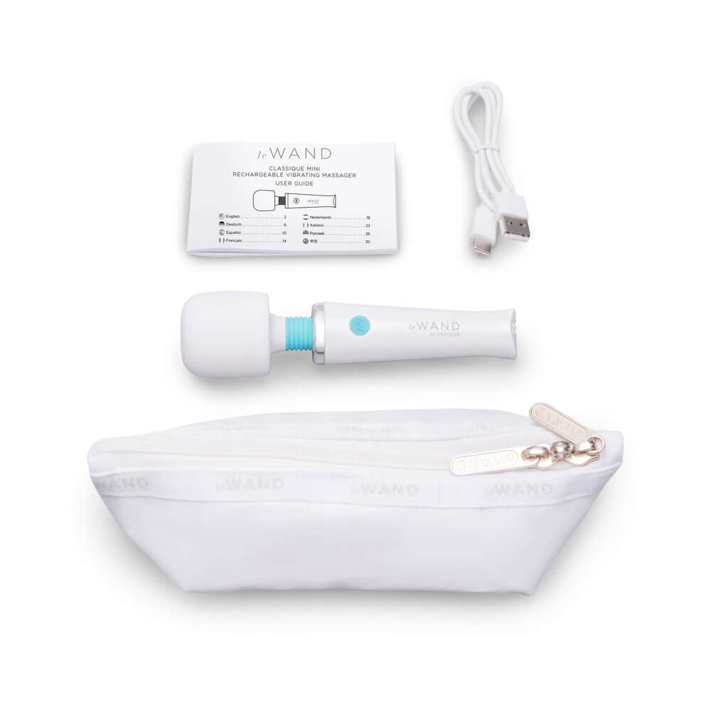 Le Wand Classique Mini Wand Massager with charging cable and storage pouch, perfect for travel and discreet use.