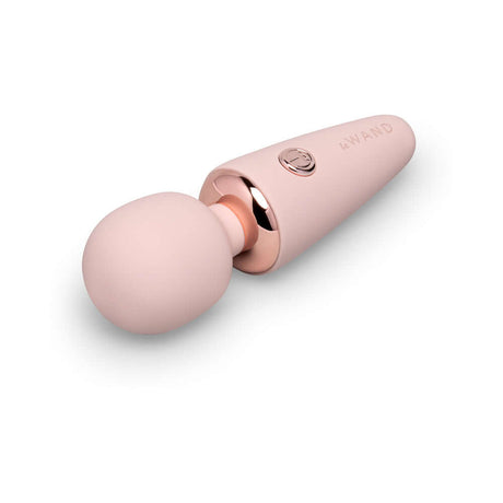 Le Wand Mini Micro Wand Rose Gold on a white background for discreet pleasure and stimulation.