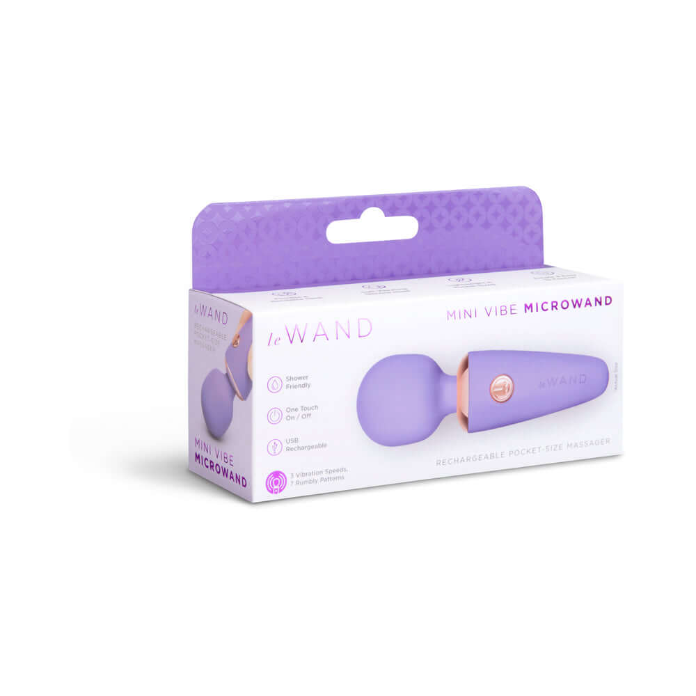Le Wand Mini Micro Wand Massager Violet packaging featuring a compact rechargeable design for portable use.