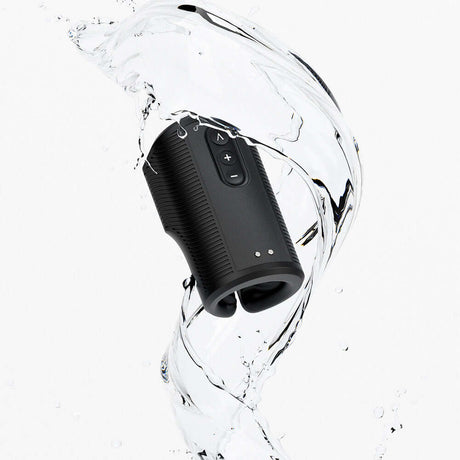 Arcwave Zing Vibrating Half Sleeve Dual Motor Masturbator surrounded by splashing water, highlighting its sleek design.