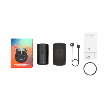 Arcwave Zing Vibrating Half Sleeve Dual Motor Masturbator kit with stroker, charging cable, and accessories.