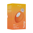We-Vibe Temp Clitoral Massager Tangerine packaging featuring heating and cooling technology for enhanced pleasure.