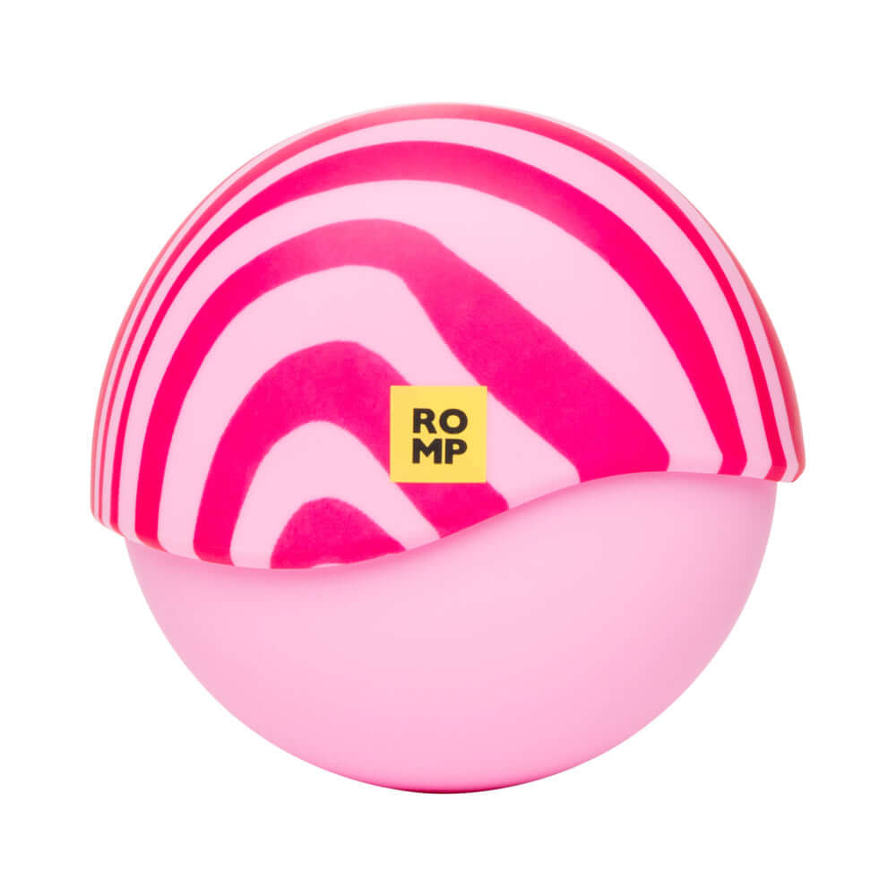 ROMP Spin Travel Rechargeable Clitoral Stimulator in pink and white striped design, compact and portable for travel.
