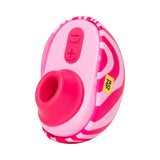ROMP Spin Travel Rechargeable Clitoral Stimulator with colorful design and adjustable suction controls.