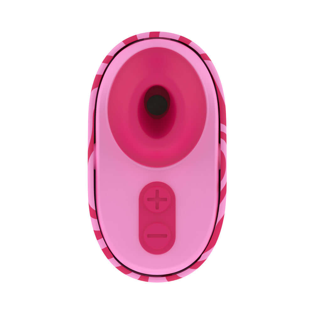 ROMP Spin Travel Rechargeable Clitoral Stimulator in pink color with buttons for intensity control.