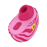 ROMP Spin Travel Rechargeable Clitoral Stimulator in pink with zebra pattern design.