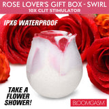 Bloomgasm The Rose Lovers Gift Box Swirl featuring a waterproof rose-shaped clitoral stimulator and red roses.