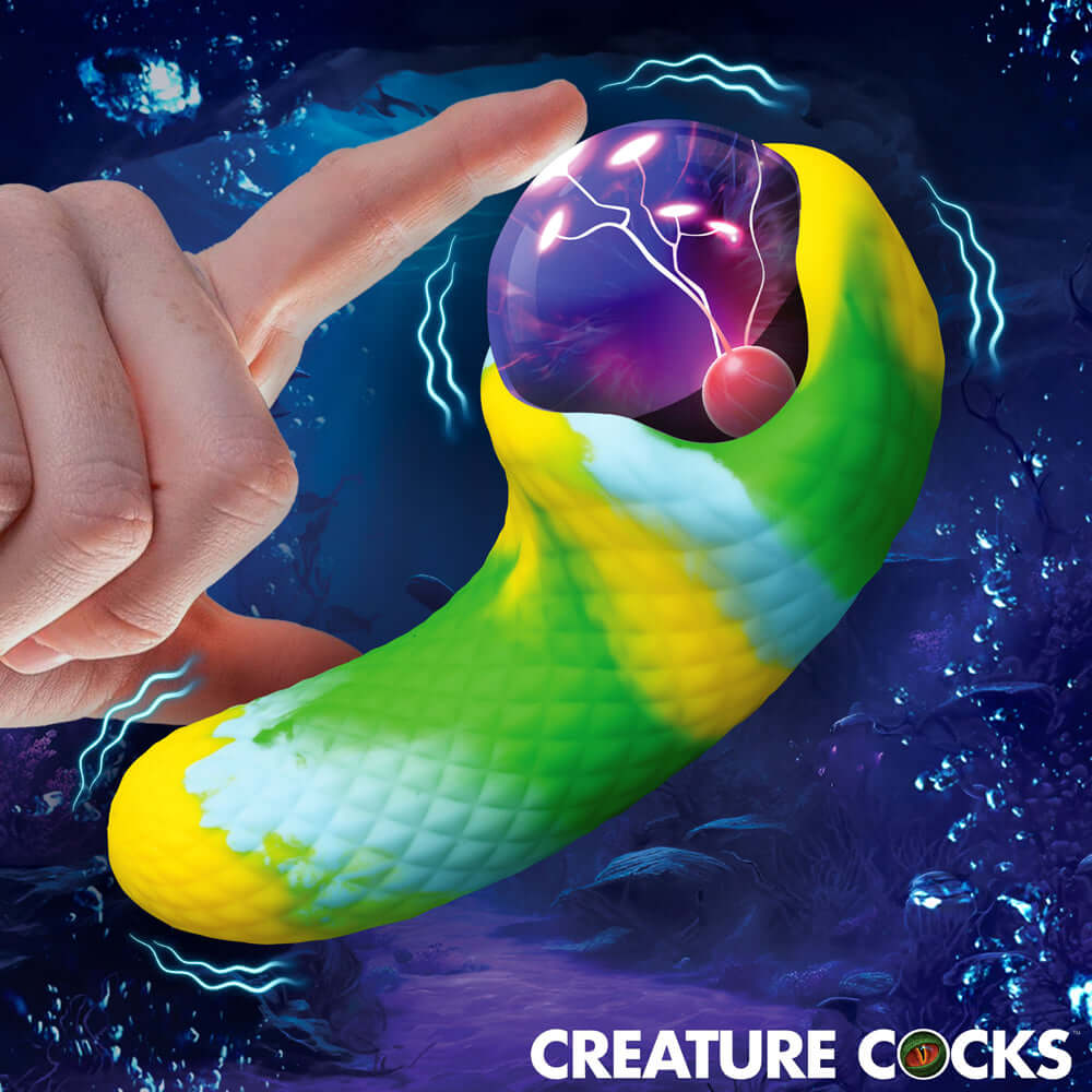 Creature Cocks Electric Eye Plasma Vibrator with textured scales in vibrant colors and a glowing orb design.