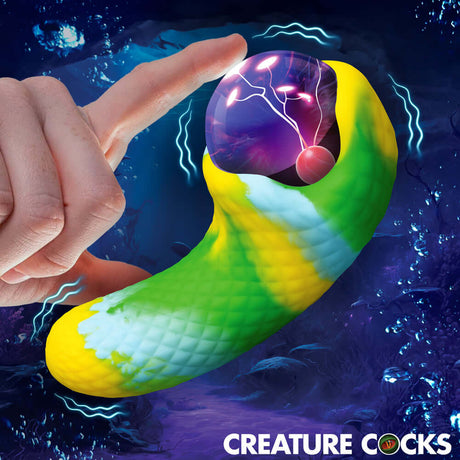Creature Cocks Electric Eye Plasma Vibrator with textured scales in vibrant colors and a glowing orb design.