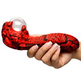 Creature Cocks Cobra Scepter Plasma Vibrator held in hand with striking red and black cobra-like design.