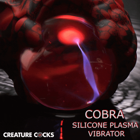 Creature Cocks Cobra Scepter Plasma Vibrator with dark red and black scales, glowing plasma effect.