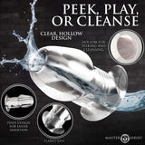 Master Series Dicked Clear Hollow Anal Plug XLarge with clear hollow design and flared base for enhanced pleasure.