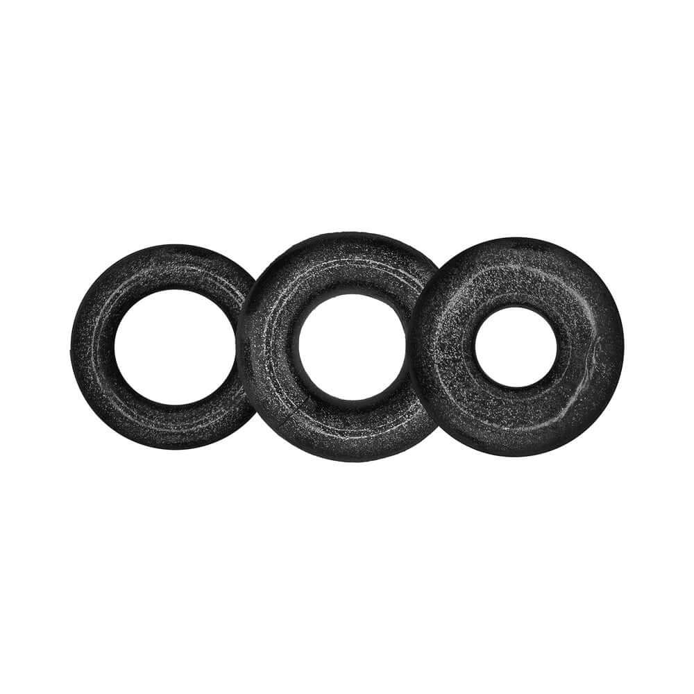 Oxballs Cockpack Multi Design 3-Pack Black Mica featuring three unique cock rings in black material.