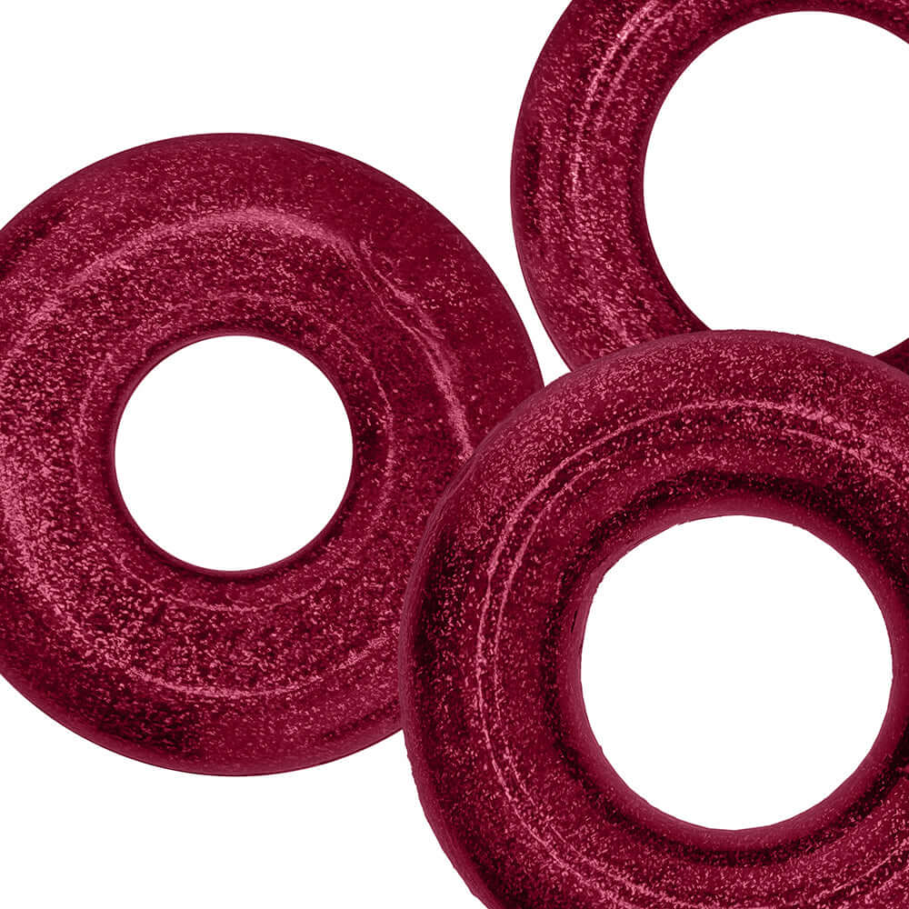 Oxballs Cockpack Multi Design 3-Pack Cherry Lips, three cherry-colored cock rings in different styles.