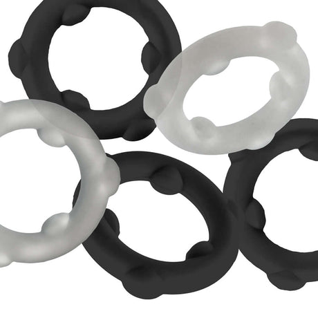 Oxballs Gearheads 5-Pack Spinner Rings Black Vapor showing black and clear cock rings on a white background.