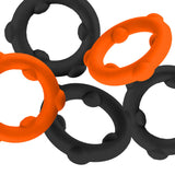 Oxballs Gearheads 5-Pack Spinner Rings Orange Black, durable ultra-stretch cock rings in orange and black color.
