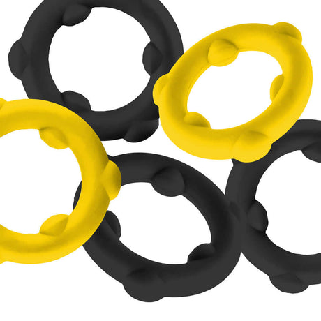 Oxballs Gearheads 5-Pack Spinner Rings Yellow Black, featuring five flexible cock rings in yellow and black.