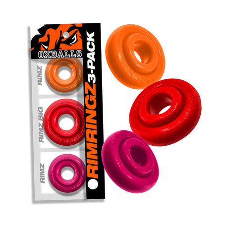 Oxballs Rimringz Multi Size 3-Pack Fire Hots featuring colorful cock rings in red, orange, and pink, ideal for comfort and flexibility.