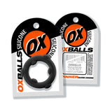 Oxballs Spinner Single Silicone Ring Black displayed in packaging, showcasing its design and branding.