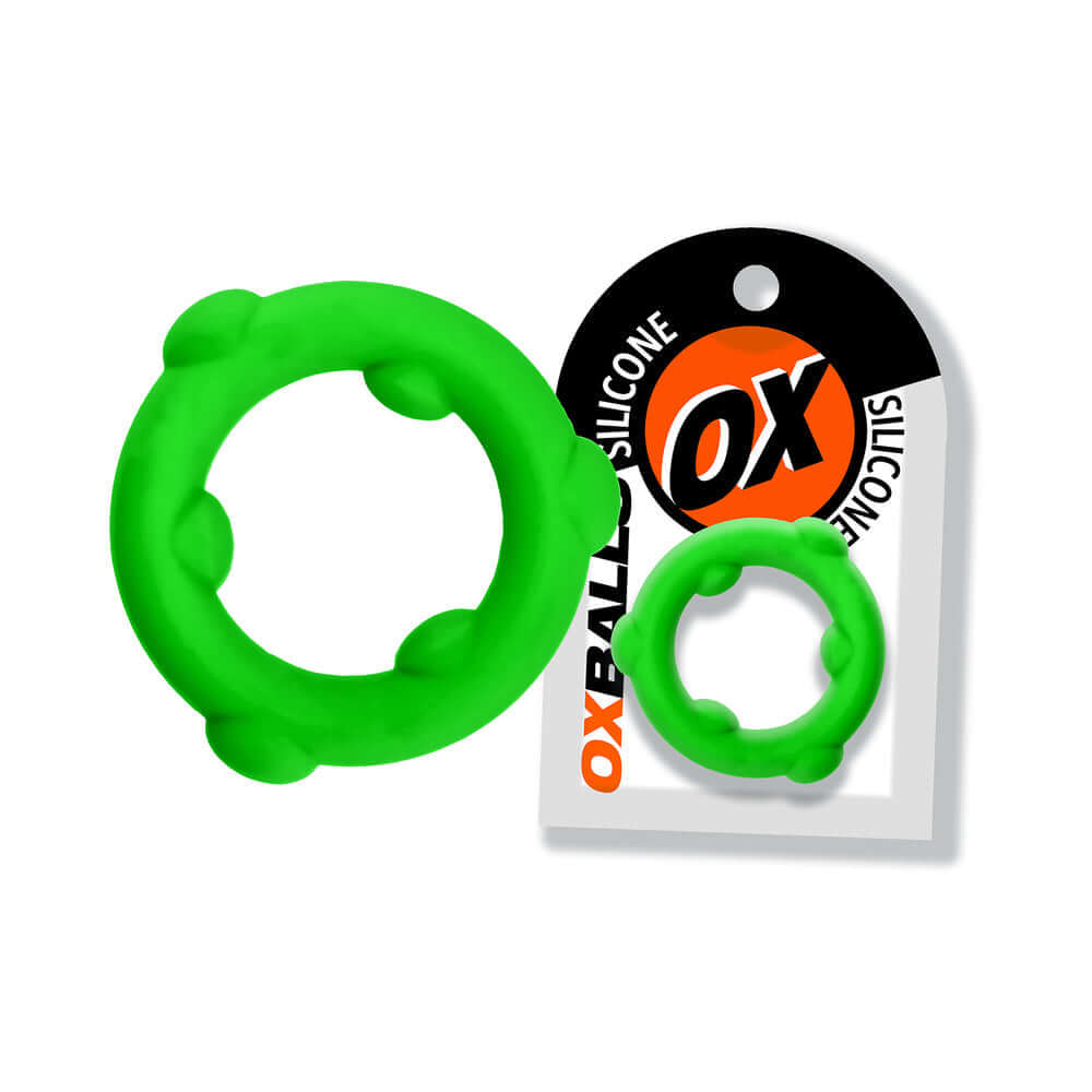 Oxballs Spinner Single Silicone Ring Frog showcased in vibrant green, featuring two sizes for optimal fit and support.
