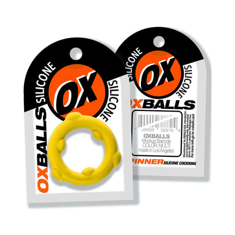 Oxballs Spinner Single Silicone Ring Yellow packaging with yellow silicone ring prominently displayed.