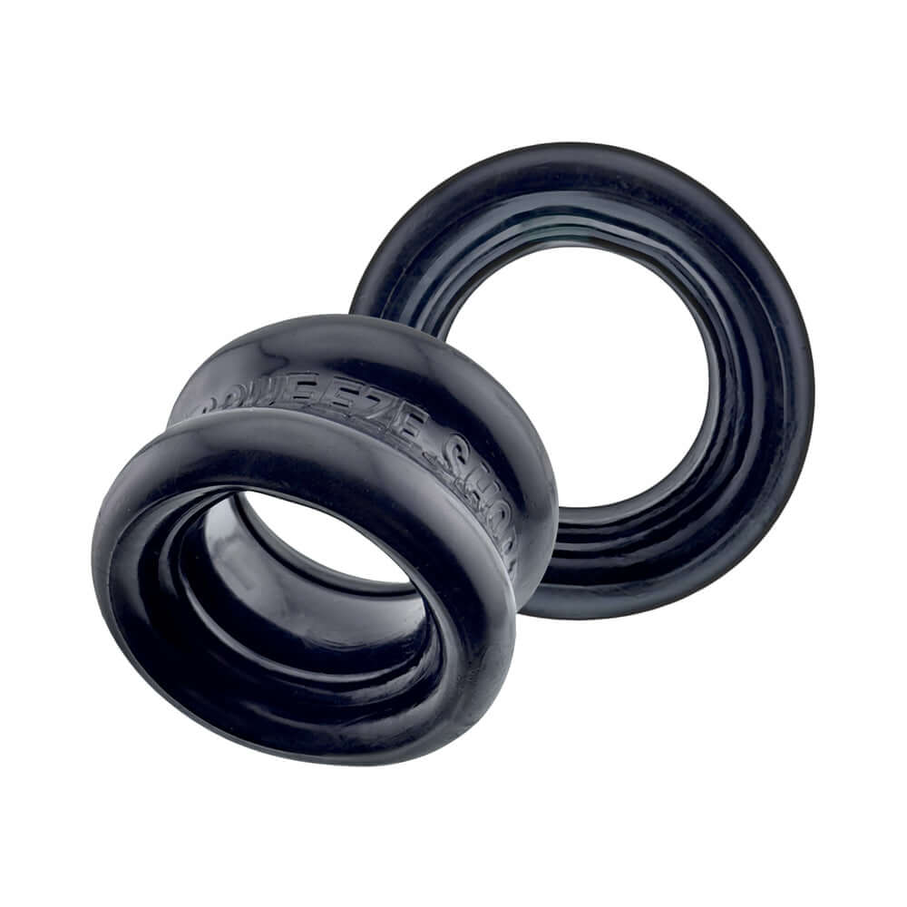 Oxballs Squeeze Short Ballstretcher Black, compact ball stretcher designed for secure stretch, displayed in black.