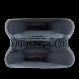 Oxballs Squeeze Short Ballstretcher Black, a compact hourglass-shaped ball stretcher for secure stretching.