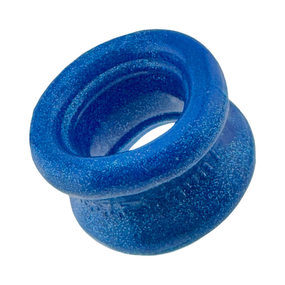 Oxballs Squeeze Short Ballstretcher Blue Fire in a vibrant blue color, featuring a compact design for secure stretching.