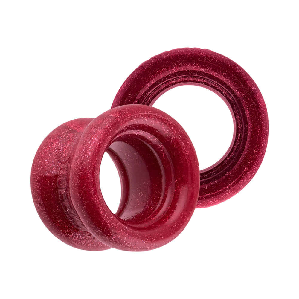 Oxballs Squeeze Short Ballstretcher Cherry Lips in red, showcasing a compact design for secure stretching.