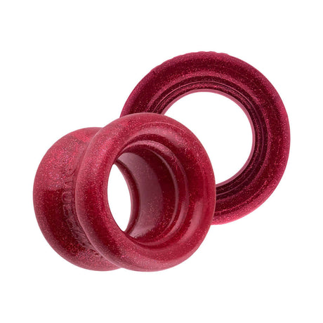 Oxballs Squeeze Short Ballstretcher Cherry Lips in red, showcasing a compact design for secure stretching.