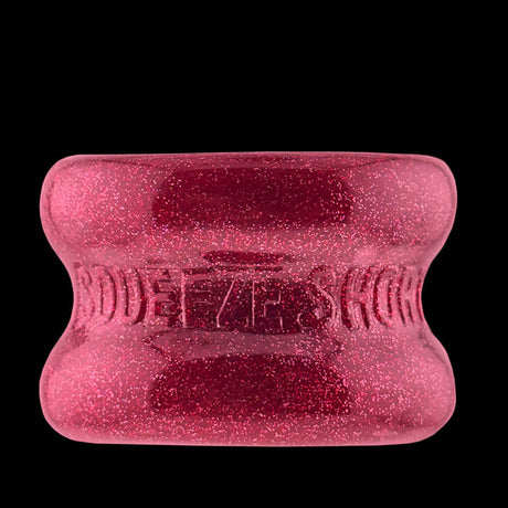 Oxballs Squeeze Short Ballstretcher Cherry Lips showing a shiny, glittery red design with an hourglass shape.