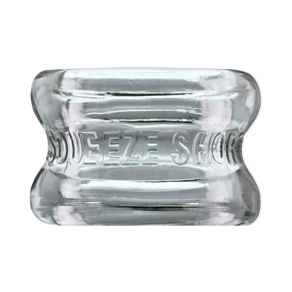 Oxballs Squeeze Short Ballstretcher Clear showing a transparent, hourglass-shaped design for comfort.