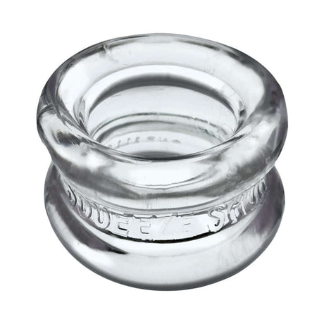 Oxballs Squeeze Short Ballstretcher Clear, a transparent, hourglass-shaped ball stretcher for comfortable use.