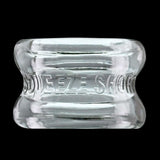 Oxballs Squeeze Short Ballstretcher Clear, featuring a compact hourglass design for comfortable use.