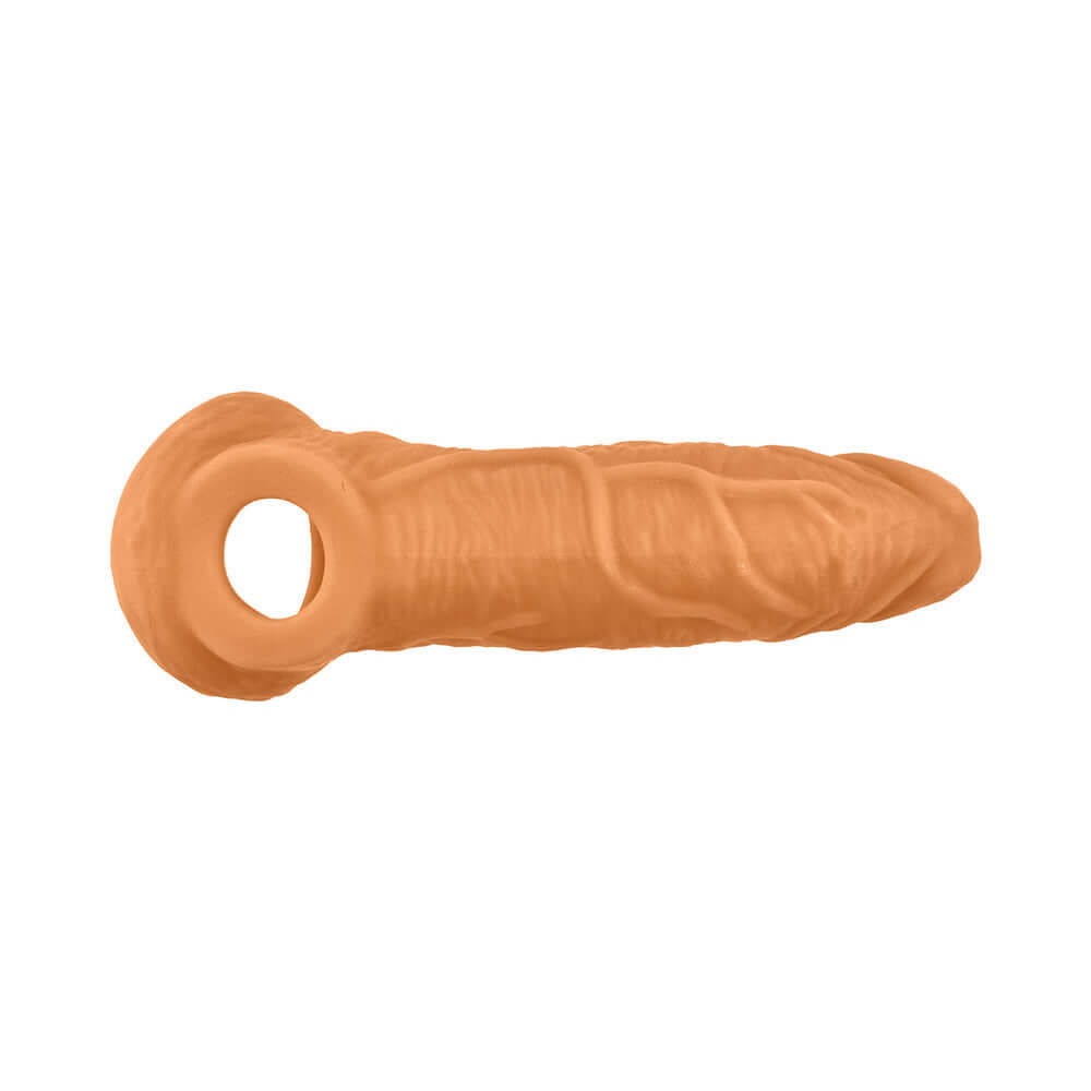Oxballs Coach Cocksheath Skinz Peachy, a realistic and adjustable sheath designed for thicker stimulation.