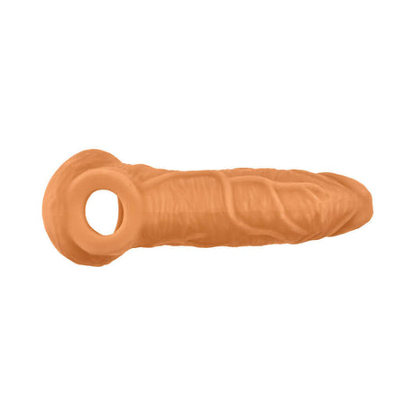 Oxballs Coach Cocksheath Skinz Peachy, a realistic and adjustable sheath designed for thicker stimulation.