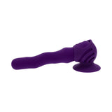 Playboy Wiggle It Vibrator Acai in purple with a twisting shaft and suction base for enhanced pleasure.