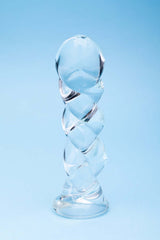 Clarity Seraphic Braid Glass Dildo on a blue background showcasing its unique spiral design.