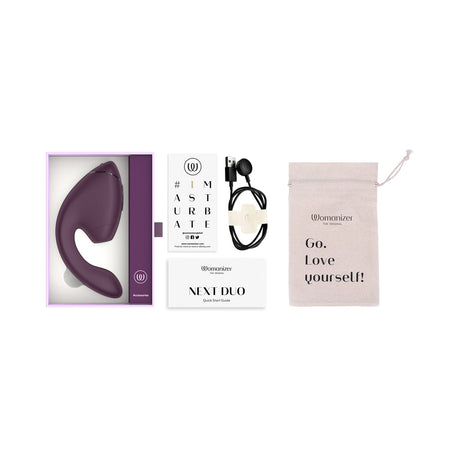 Womanizer Next Duo Massager Dark Purple, included accessories, and packaging showcasing the luxurious design.