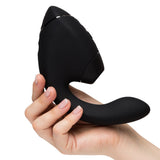 Womanizer Next Duo Massager Black held in hand, showcasing its sleek design and dual stimulation features.