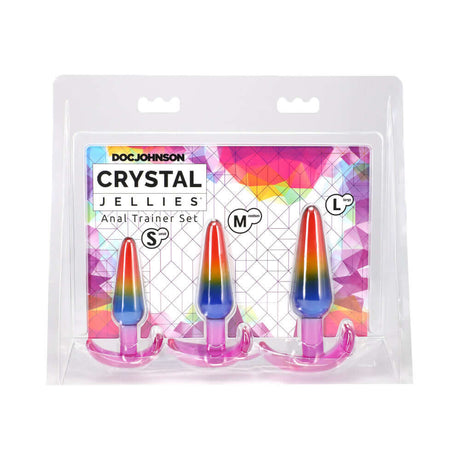 Crystal Jellies Anal Trainer Set S M L Rainbow featuring three tapered plugs in vibrant rainbow colors.