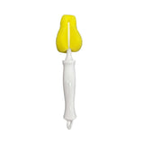 Delite Masturbator with Tongue Action White showing a yellow applicator with a white handle for intimate pleasure.
