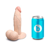 b-Vibe Slipskin Realistic Silicone Dildo 6 inch Girthy Cream next to a can for size comparison