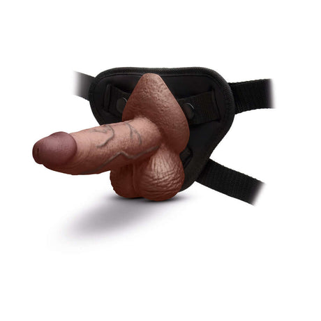 b-Vibe Slipskin Realistic Silicone Dildo 6 inch Girthy Brown in harness for enhanced pleasure.