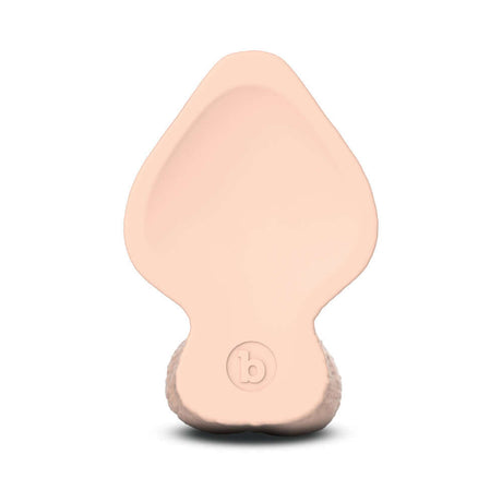 Bottom view of the b-Vibe Slipskin Realistic Silicone Dildo 7 inch Girthy Cream, showcasing its lifelike design.