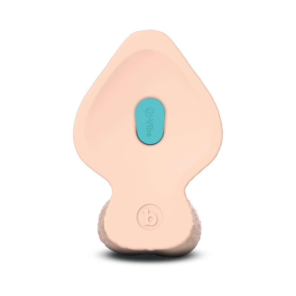 Bottom view of b-Vibe Slipskin Realistic Silicone Dildo 9 inch Girthy Cream showcasing its design and silicone texture.