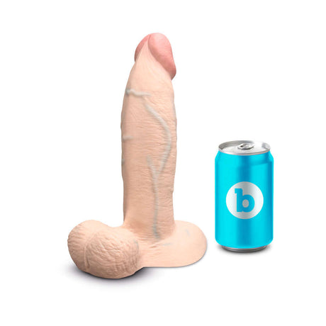 b-Vibe Slipskin Realistic Silicone Dildo 9 inch Girthy Cream beside a can for size comparison.