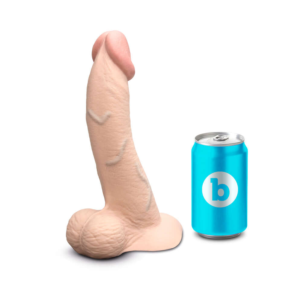 b-Vibe Slipskin Realistic Silicone Dildo 9 inch Curved Cream next to a can for size comparison